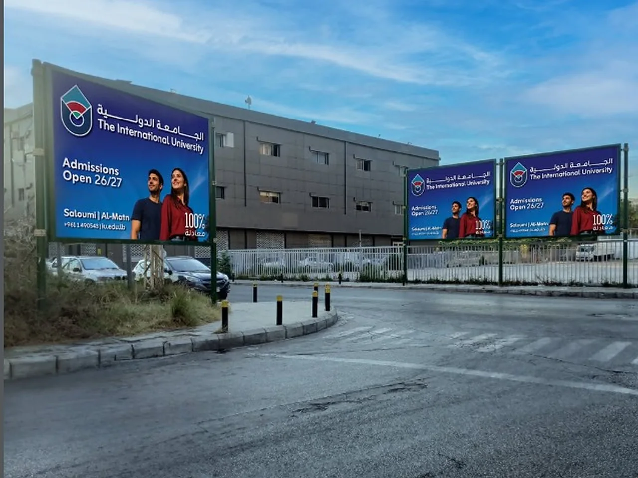 Group Plus billboards on a Lebanese street